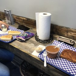 The Fresh Stop - Dinning table inside, the Cuban sub & grilled cheese