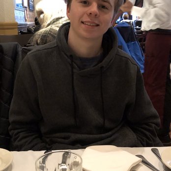 Rosie O'Grady's - A happy teen at Rosie's - Irish Near Me - New York, New York