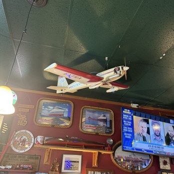 The Islander Bar - Ceiling model plane - Tacos Near Me - Hessel, Michigan