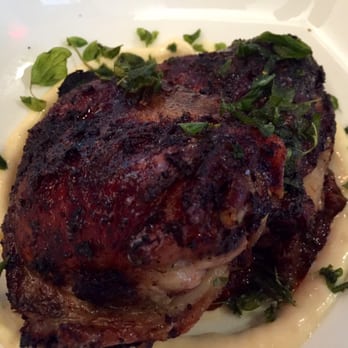 Launderette - Chicken thighs. Honestly, I think the pic looks kind of gross but they were very tasty! - New American Near Me - Austin, Texas