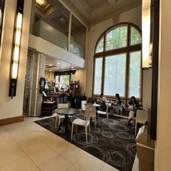 Aiyaohno Cafe - sky high ceilings, crown moulding, and a giant arched window flood the room with light - Cafes Near Me - Vancouver, British Columbia Aiyaohno Cafe - sky high ceilings, crown moulding, and a giant arched window flood the room with light - Cafes Near Me - Vancouver, British Columbia