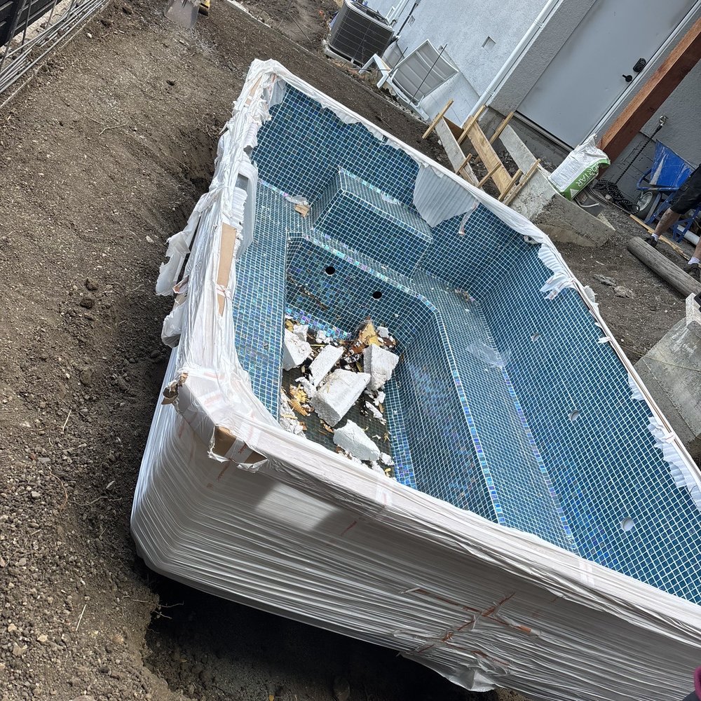 Movers With Maneuvers - Bringing a nearly 2,000-lb spa down a steel incline - Movers Near Me