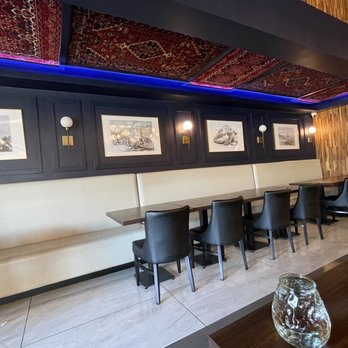 Bread & Salt Afghan Cuisine - Wall with paintings with Afghan artists - Afghan Near Me - Mississauga, Ontario Bread & Salt Afghan Cuisine - Wall with paintings with Afghan artists - Afghan Near Me - Mississauga, Ontario
