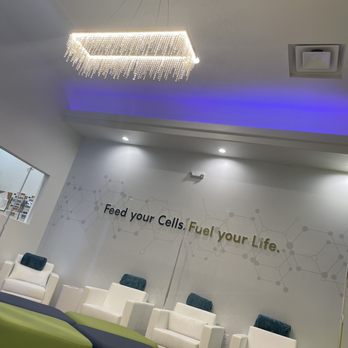 The DRIPBaR - Scottsdale - Beautiful and spotless lounge with outlets to charge your phone. Blankets and water. Gorgeous chandelier. - IV Hydration Near Me - Scottsdale, Arizona