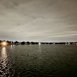 Lago De Claire - Lake with a car's headlights