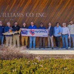AG Williams Painting Company - The A.G. Williams team proudly stands together in front of our headquarters--celebrating a shared commitment to craftsmanship and teamwork.