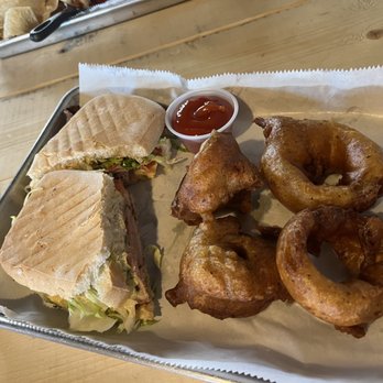 Krootz Brewing Company - Krootz Klein Panini with onion rings - Brewpubs Near Me - Gainesville, Texas