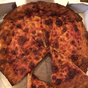 Pepperoni’s Tavern - Burnt cheese pizza - Pizza Near Me - Alpharetta, Georgia Pepperoni’s Tavern - Burnt cheese pizza - Pizza Near Me - Alpharetta, Georgia