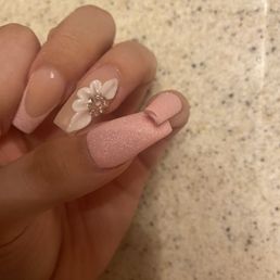 You can see the space in my thumb between the acrylic and my real nail. I took this picture the same day I got them done. You can see the space in my thumb between the acrylic and my real nail. I took this picture the same day I got them done.