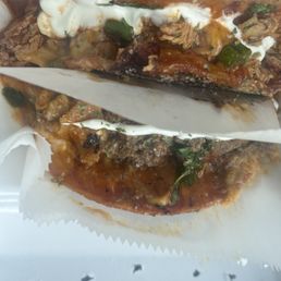 Steak and chicken Parmesan enchiladas. With no black olives nor cilantro. Steak and chicken Parmesan enchiladas. With no black olives nor cilantro.