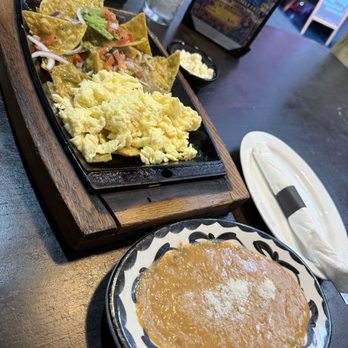 Kalaveras - This are not Chilaquiles Verdes more like chips poquita salsa eggs not cook right beans where cold - Mexican Near Me - Orange, California Kalaveras - This are not Chilaquiles Verdes more like chips poquita salsa eggs not cook right beans where cold - Mexican Near Me - Orange, California