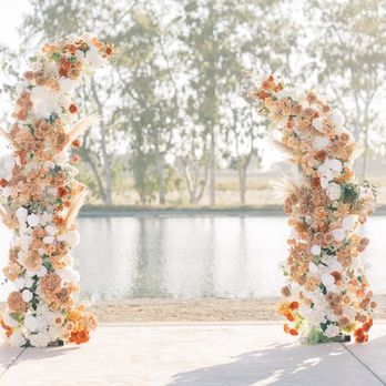 Lakeview Estates & Winery - a wedding arch decorated with flowers - Venues & Event Spaces Near Me - Sacramento, California