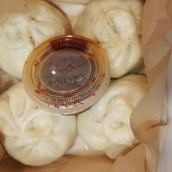 Kimchi Box - 4 Piece Seoul Dumplings, sauce was only a tad spicy but meshed well with the dumpling. - Korean Near Me - Sterling Heights, Michigan Kimchi Box - 4 Piece Seoul Dumplings, sauce was only a tad spicy but meshed well with the dumpling. - Korean Near Me - Sterling Heights, Michigan
