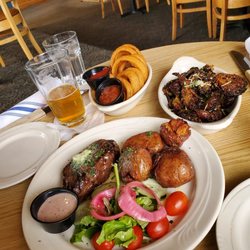 Niblick & Greene's Restaurant/brassie's Bar - Bavette Steak with red potatoes & salad, Brussel Sprouts, and onion rings.
