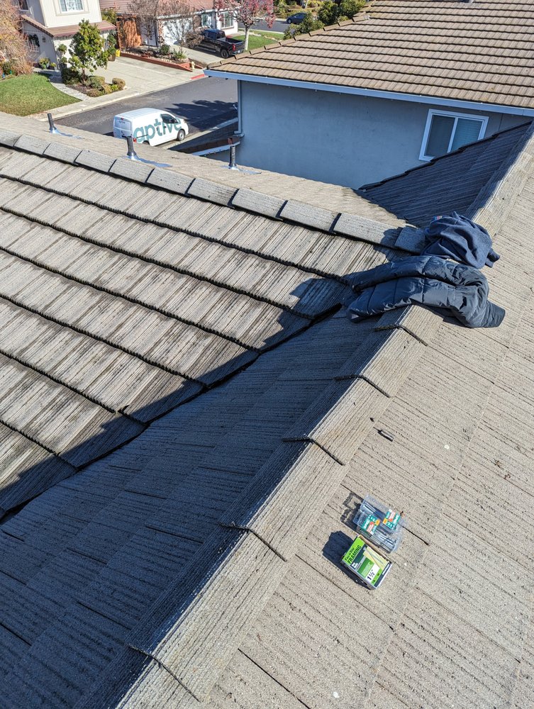 Slide of Total Package Roofing