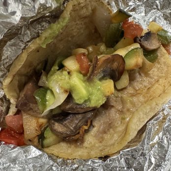 Guisados - Veggie Taco with a tiny drop of Salsa Verde. - Tacos Near Me - Long Beach, California Guisados - Veggie Taco with a tiny drop of Salsa Verde. - Tacos Near Me - Long Beach, California