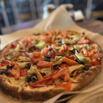 Rustic Fire - a pizza on a wooden table - Pizza Near Me - Paso Robles, California Rustic Fire - a pizza on a wooden table - Pizza Near Me - Paso Robles, California