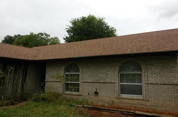 Slide of Tim's Roofing