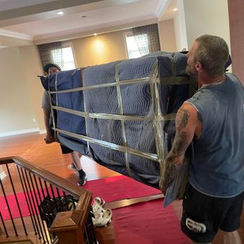 Parkview Moving Co - Parkview Moving Co. movers carefully carrying a fully wrapped sofa during a residential move in Ottawa. - Movers Near Me - Ottawa, Ontario Parkview Moving Co - Parkview Moving Co. movers carefully carrying a fully wrapped sofa during a residential move in Ottawa. - Movers Near Me - Ottawa, Ontario