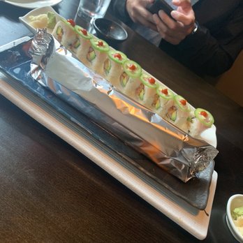 Star Sushi & Bar - Charizard Roll in foil and on fire! - Ramen Near Me - Seattle, Washington Star Sushi & Bar - Charizard Roll in foil and on fire! - Ramen Near Me - Seattle, Washington