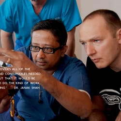 SEE International - Dr. Janak Shah examines a patient.