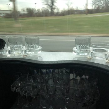 Black Crown Limousine - 'Rinsed' cups displayed on rusting/moldy base - Limos Near Me