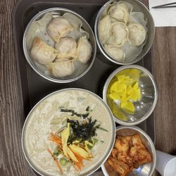 Arirang Korean Kitchen - Pork dumpling(right) kimchi dumpling (left), and sesame nooodles