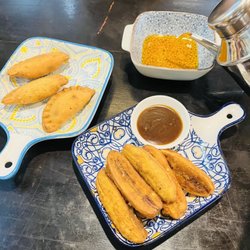 Dennis Coffee Garden - Pastil (Hand pies with togue served with sweet spicy sauce) Juwalan- deep fried bananas w/ coconut jam dip.