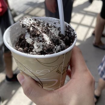 The Gal's Place - a hand holding a cup of ice cream - Bakeries Near Me - Alexandria Bay, New York The Gal's Place - a hand holding a cup of ice cream - Bakeries Near Me - Alexandria Bay, New York