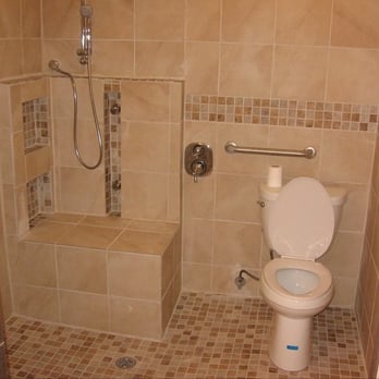 Wharton Construction - a bathroom with a toilet and shower - General Contractors Near Me Wharton Construction - a bathroom with a toilet and shower - General Contractors Near Me