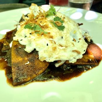 Claro - Chilaquiles - braised short rib, mole negro, totopos, cream - Mexican Near Me - Brooklyn, New York