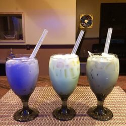Royal Thai - Taro , honeydew, motcha green tea over ice .  Available with boba ( black tapioca pear).