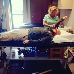 Crest Physical Therapy - Therapist working with patient.