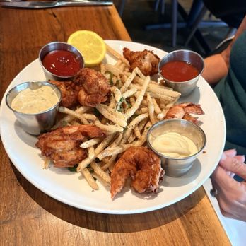 Shore Raw Bar & Grill - Seafood platter with shrimp, oysters and fish with fries - Seafood Near Me - Austin, Texas Shore Raw Bar & Grill - Seafood platter with shrimp, oysters and fish with fries - Seafood Near Me - Austin, Texas