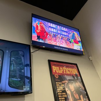 CM Chicken - two televisions mounted on a wall - Korean Near Me - Pickerington, Ohio