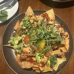 Poke nachos - only $12 at happy hour and soo yummy! Poke nachos - only $12 at happy hour and soo yummy!