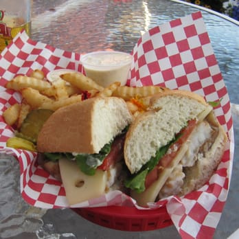 The Cabin - Baked, not fried, fish sandwich. Very delicious with their special tartar. - Pubs Near Me - Shoreline, Washington