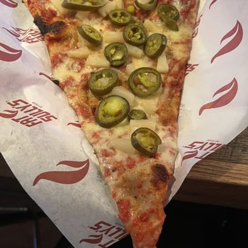 Fat Sully's Pizza - Slice with pineapples and jalapeños - Pizza Near Me - Kansas City, Missouri Fat Sully's Pizza - Slice with pineapples and jalapeños - Pizza Near Me - Kansas City, Missouri