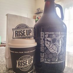 Rise Up Coffee - 64oz. growler of Rise Up roaster cold brew to take home, and quad oat cortado my usual for the road.