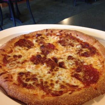 Bellacino's Pizza & Grinders - 8" Pepperoni.  They don't have slices here so if you don't want to eat a medium by yourself, this is your option.  $5 - Pizza Near Me - Richmond, Virginia
