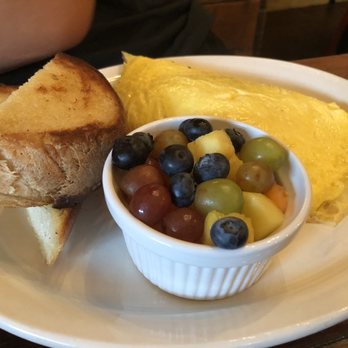 Toast - Omelette with spinach, bacon and gruyere - Breakfast & Brunch Near Me - New Orleans, Louisiana Toast - Omelette with spinach, bacon and gruyere - Breakfast & Brunch Near Me - New Orleans, Louisiana