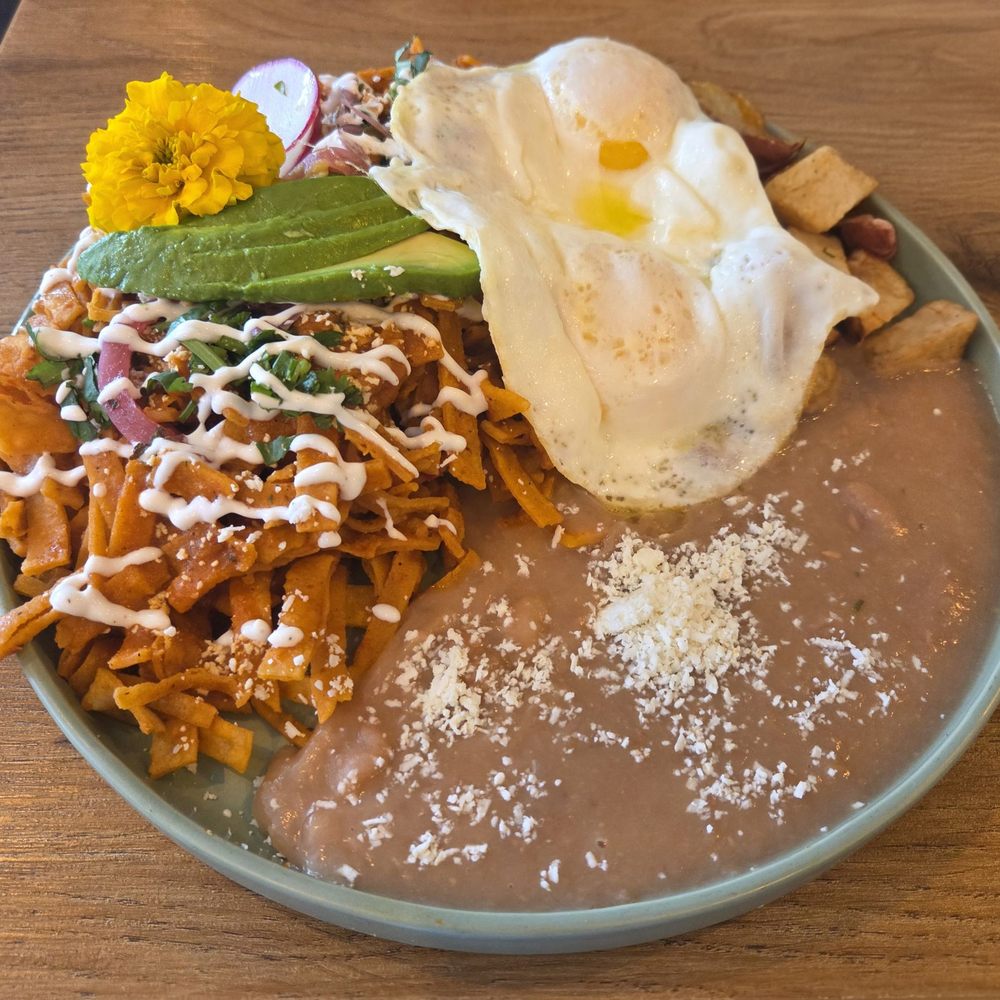 El Encanto - Chilaquiles rojos with over medium eggs - Breakfast & Brunch Near Me - San Diego, California El Encanto - Chilaquiles rojos with over medium eggs - Breakfast & Brunch Near Me - San Diego, California