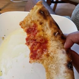 Calabrian (the oil smear on my plate is olive oil I added to dip the crust in, not pizza oil) Calabrian (the oil smear on my plate is olive oil I added to dip the crust in, not pizza oil)