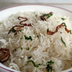 Spice Route Ruakaka - Rice with pan fried onion and cilantro.