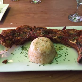 Platos - Can Can Pork chops with Tapioca (Yuca) Mofongo. - Latin American Near Me - Carolina, Puerto Rico Platos - Can Can Pork chops with Tapioca (Yuca) Mofongo. - Latin American Near Me - Carolina, Puerto Rico