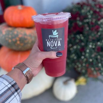 Nutrition Nova - a person holding a cup of juice - Juice Bars & Smoothies Near Me - Mount Juliet, Tennessee Nutrition Nova - a person holding a cup of juice - Juice Bars & Smoothies Near Me - Mount Juliet, Tennessee