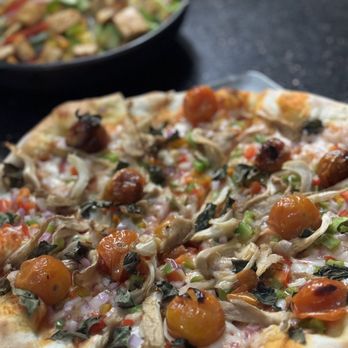 Mango Haus - Margarita, pizza with vegan cheese, and added veggies. Love the crust!! Very tasty :) - Breakfast & Brunch Near Me - Bakersfield, California Mango Haus - Margarita, pizza with vegan cheese, and added veggies. Love the crust!! Very tasty :) - Breakfast & Brunch Near Me - Bakersfield, California