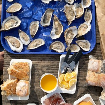 Hog Island Oyster - 2 dozen oysters + our goodies we brought from home - Seafood Near Me - Marshall, California