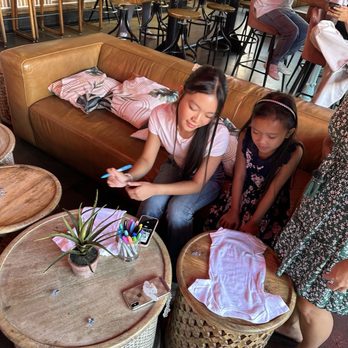 Punch Bowl Social - Couch seating in the middle, perfect for activities - Gastropubs Near Me - Rancho Cucamonga, California