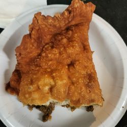 Nonos Empanadas & Sweets - Half of a beef, rice, and black bean empanada
